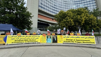 وین - تظاهرات ایرانیان آزاده در برابر مقر آژانس بین‌المللی انرژی اتمی، علیه سیاست‌های توسعه‌طلبانه آخوندها - ۱۴خرداد