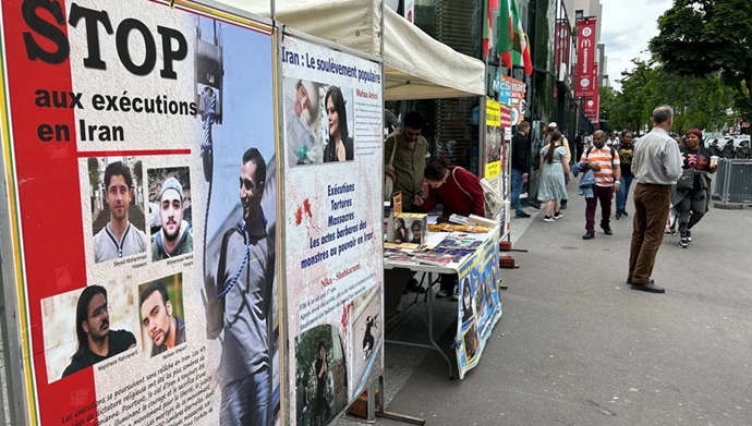 پاریس - برگزاری میز کتاب و نمایش تصاویر شهیدان