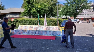 آرئوی سوئیس - برگزاری میزکتاب و نمایش تصاویر شهیدان در همبستگی با قیام سراسری - ۲۱تیرماه 