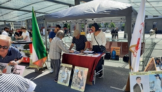 برن سوئیس - برگزاری میز کتاب در همبستگی با قیام سراسری توسط ایرانیان آزاده - ۱۸تیرماه