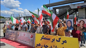 برن سوئیس - برگزاری میز کتاب و نمایش تصاویر شهیدان در همبستگی با قیام سراسری