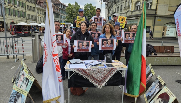 برن - سوئیس، برگزاری میز کتاب و نمایش تصاویر شهیدان علیه صدور احکام اعدام توسط قضاییه خامنهای - ۱۹اردیبهشت