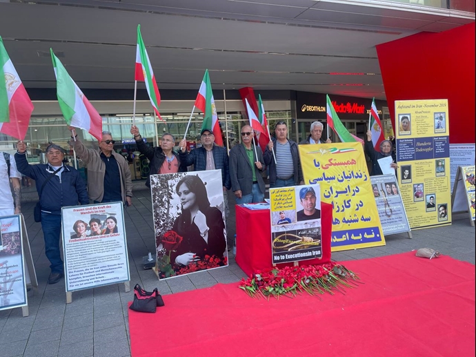 هامبورگ - میز کتاب و نمایشگاه عکس شهیدان و محکومیت اعدام مجاهد کور کور - ۲۲خرداد ۱۴۰۴