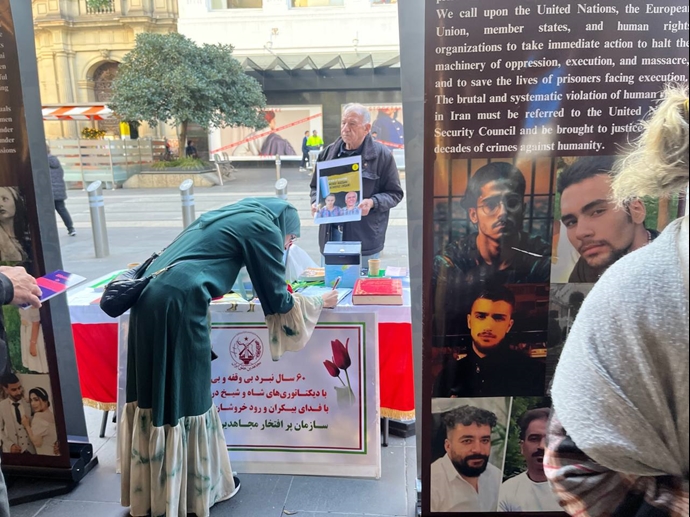 هایدلبرگ - برگزاری میز کتاب و نمایشگاه تصاویر شهیدان در همبستگی با قیام سراسری مردم ایران - ۲۴خرداد