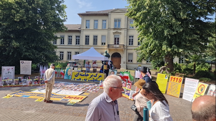هایدلبرگ - برگزاری میز کتاب و نمایشگاه تصاویر شهیدان در همبستگی با قیام سراسری مردم ایران - ۲۴خرداد