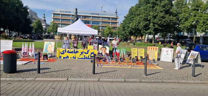 مانهایم - میز کتاب و نمایشگاه عکس شهیدان در حمایت از قیام سراسری - ۲۷ تیر
