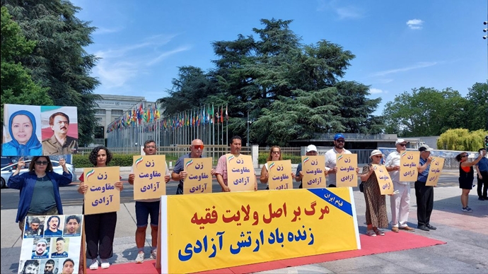 ژنو میدان ناسیون - برگزاری میز کتاب و نمایش تصاویر شهیدان در همبستگی با زندانیان سیاسی و قیام سراسری - ۱۴تیرماه
