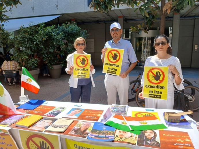 لوگانو سوئیس - برگزاری میز کتاب و نمایش تصاویر شهیدان در همبستگی با قیام سراسری - ۲۱تیرماه