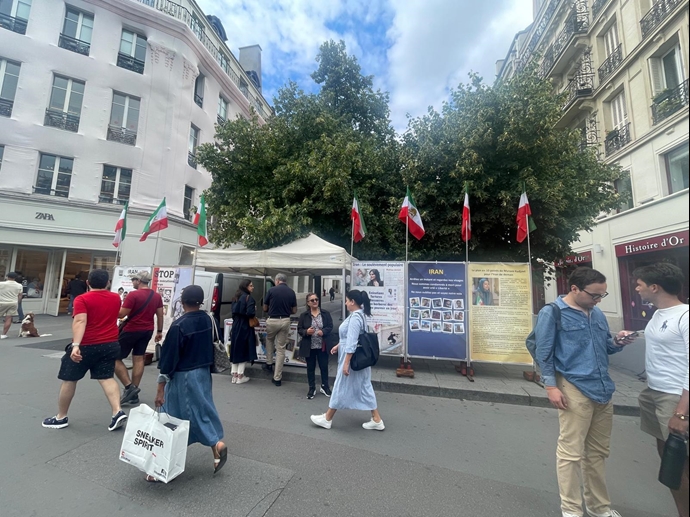 پاریس - برگزاری میز کتاب و نمایش تصاویر شهیدان در حمایت از زندانیان سیاسی - ۳۱ تیر ۱۴۰۴