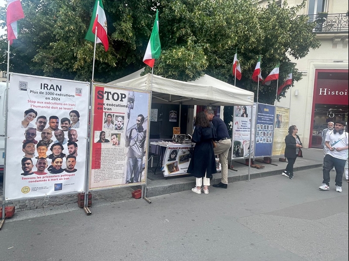 پاریس - برگزاری میز کتاب و نمایش تصاویر شهیدان در حمایت از زندانیان سیاسی - ۳۱ تیر ۱۴۰۴