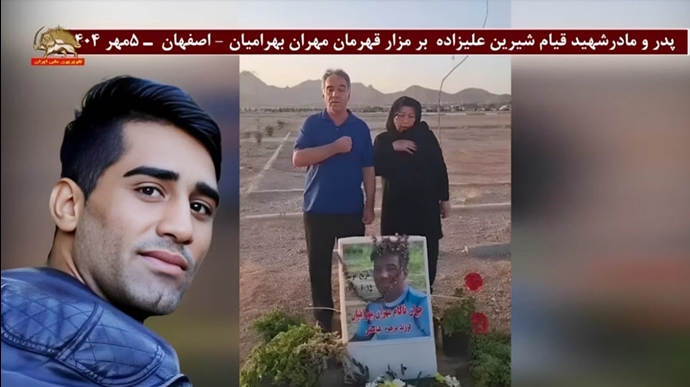 پدر و مادر شهید قیام شیرین علیزاده بر مزار قهرمان مهران بهرامیان 