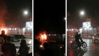  قیام مشهد - آتش‌زدن خودروی نیروهای سرکوبگر مقابل استانداری