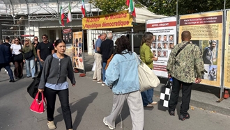 پاریس - برگزاری میز کتاب و نمایشگاه تصاویر شهیدان قیام توسط هواداران سازمان مجاهدین 