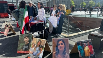 برن سوئیس - برگزاری میز کتاب توسط هواداران سازمان مجاهدین در اعتراض به اعدام زندانیان سیاسی 