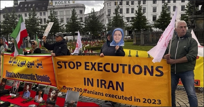کپنهاگ - آکسیون ایرانیان آزاده علیه اعدامهای جنایتکارانه خامنه‌ای و در حمایت از برقراری یک جمهوری دموکراتیک در ایران - ۱۲تیرماه