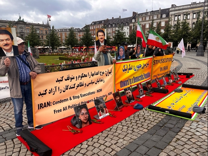 کپنهاگ - آکسیون ایرانیان آزاده علیه اعدامهای جنایتکارانه خامنه‌ای و در حمایت از برقراری یک جمهوری دموکراتیک در ایران - ۱۲تیرماه