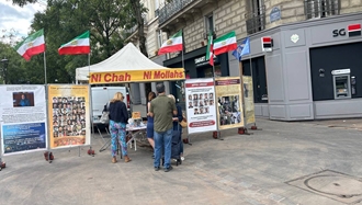 برگزاری میز کتاب توسط هواداران سازمان مجاهدین در گرامیداشت شهیدان قیام در پاریس