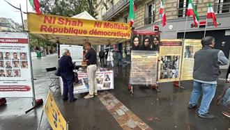 پاریس - برگزاری میز کتاب توسط هواداران سازمان مجاهدین علیه اعدامهای جنایتکارانه قضاییه خامنه‌ای 